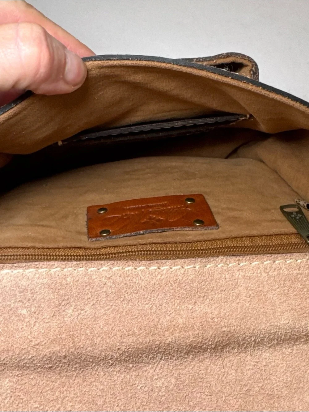 Patricia Nash Bonella Mini Crossbody Saddle Bag in their signature tan/cognac